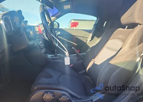 2009 Nissan 370Z z USA, uszkodzony, nr VIN JN1AZ44EX9M403788